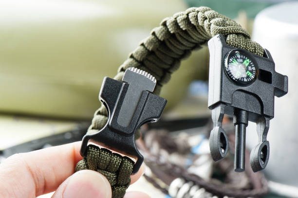 closeup green multifunction paracord survival bracelet for camping military paracord bracelet with a compass